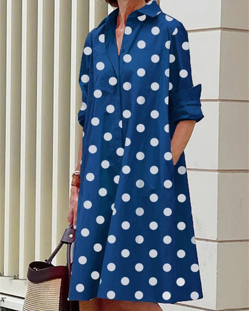 Vestido midi abotonado · Topos azules