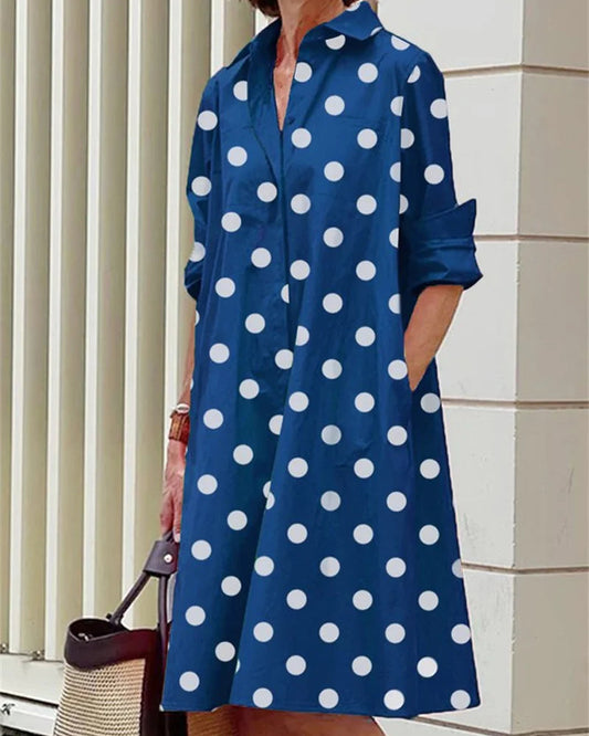 Vestido midi abotonado · Topos azules