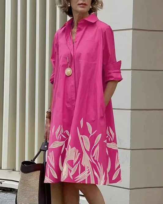 Vestido midi abotonado · Flores rojas
