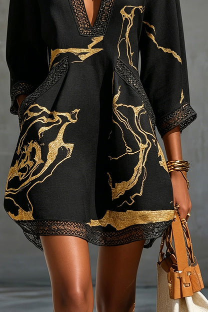 SIRA MONTERO | Vestido corto de crochet negro con detalles dorados y escote en V - Negro