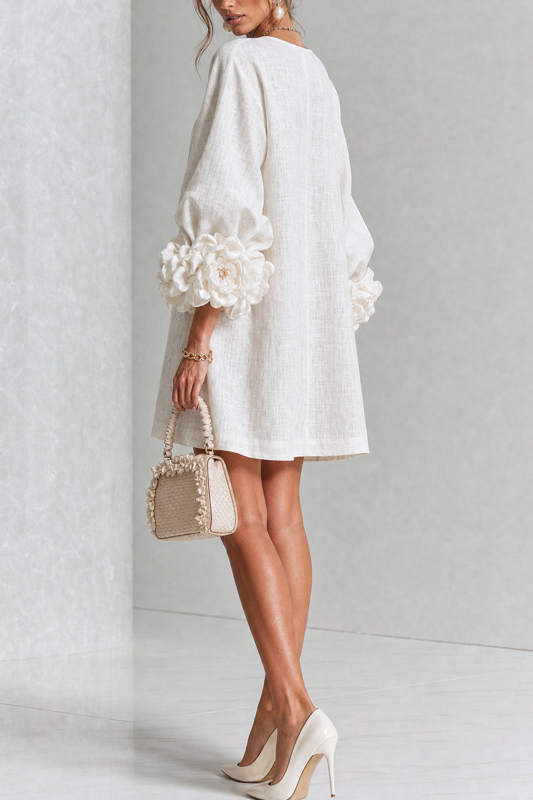 SIRA MONTERO | Vestido mini de lino con puños anudados y botones florales - Blanco