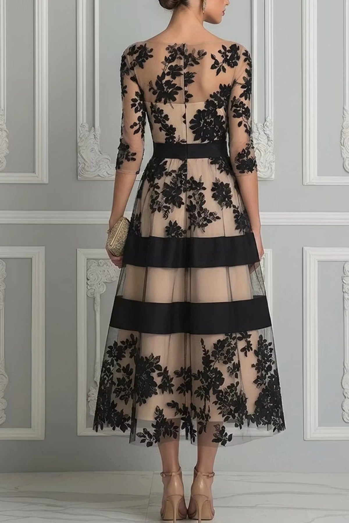 Vestido midi de encaje floral y tul negro de Sira Montero