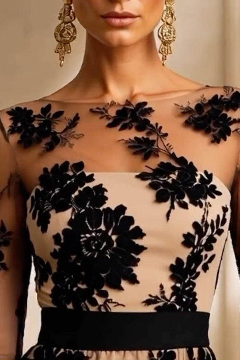 Vestido midi de encaje floral y tul negro de Sira Montero