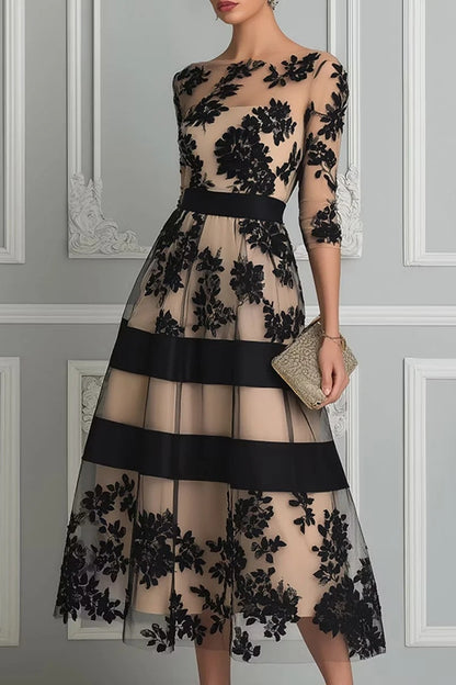 Vestido midi de encaje floral y tul negro de Sira Montero